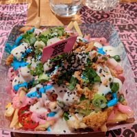 Iconic rainbow fries at Vegan Junk Food Bar - El Born in Barcelona