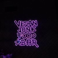 Cool neons inside, the decor is really nice too at Vegan Junk Food Bar - El Born in Barcelona