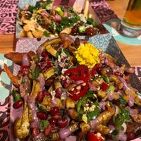 Loaded freak fries with sweet potatoes and shawarma-style vegan meat  at Vegan Junk Food Bar - El Born in Barcelona