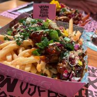 Loaded fries with regular fries and vegan rib-styled meat  at Vegan Junk Food Bar - El Born in Barcelona