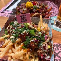 Loaded fries with regular fries and vegan rib-styled meat  at Vegan Junk Food Bar - El Born in Barcelona