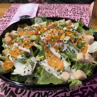 Cesar salad with sashimi salmon    at Vegan Junk Food Bar - El Born in Barcelona