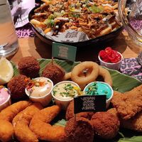 Kapsalon & a plate with all their entries at Vegan Junk Food Bar - El Born in Barcelona