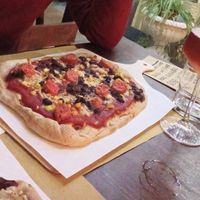 Mexican pizza (corn, mozzarella, black beans, wurst) at Laboratorio - Food. Drink. Green Cosmetics in Jesi