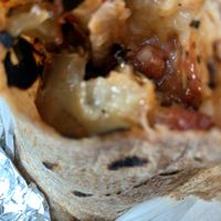 (close) Vegan Eggplant Parm Hero on a wrap at Donna's Pizzeria in Saddle Brook