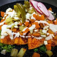 Enchiladas queretanas rellenas de queso at Taika Vegan Food in Queretaro