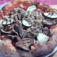 Their standard vegan pizza (though others can be veganized with the vegan cheese). at Giardino in Bellinzona