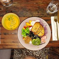 Vegan poke bowl with lots of veggies, fruits and tempeh at Gostilna Vida in Ljubljana