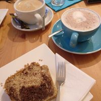 Nutcake, hot chocolate and cafe crema with oatmilk (Oatly Barista) at Kaffeetasse in Buehl