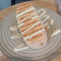 El Choripan Vegano - 
Grilled Bocatta bread with chorizo, tomato, house sauce and pickled onion  at Debby's Good Veggie Food in Barcelona