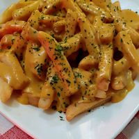 Improved cheese fries, actually a cheesy cashew poutine, impressive! at The Peanut Bar Restaurant in Reading