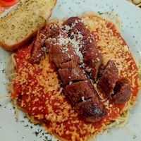 Spaghetti marinara with sausage, very tender at The Peanut Bar Restaurant in Reading