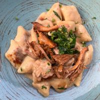 Potato dumplings with chanterelles at The Botanist in Warsaw