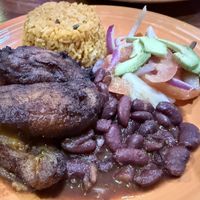 Yellow rice, beans, sweet plantain, avocado saladd  at El Coqui in Santa Rosa
