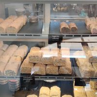 the top shelf contains vegan štruklji: vegetables, chocolate, plum&cinnamon at Moji Struklji - My Dumplings of Slovenia in Ljubljana