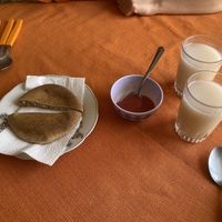 Bread, spicy sauce and chia-based drink  at Snack Vegetariano Dona Franca in Sucre
