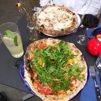 Vegan one with grilled veggies, vegan cheese and fresh arugula at Tazzi Pizza in Hamburg