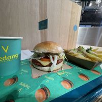 Apfelschorle, Cheesy Burger & Cheesy Fries  at Vedang - green burger | Bikini in Berlin