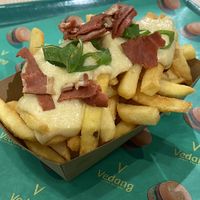 Cheese fries with vegan bacon for an extra euro  at Vedang - green burger | Bikini in Berlin