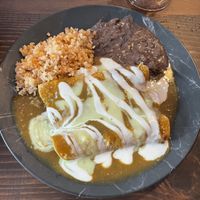 Enchiladas filled with mashed potatoes, rice and beans  at Sol de Maple in Cozumel