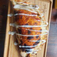 Vegan Mexican pizza calzone at Sol de Maple in Cozumel