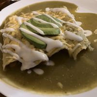 Yummy enchiladas, full of potatoes and soyrizo. Also came with rice and beans    at Sol de Maple in Cozumel