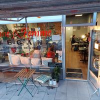 Exterior. Situated on a quiet street with charming retro neon signs. at Bonne Femme in Johanneshov