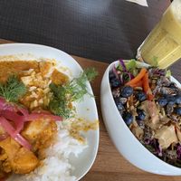 Potato and chickpea dish with a delicious salad and excellent banana,coconut, turmeric and ginger smoothie with oat milk at Mama  in Reykjavik