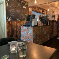 A beautiful vibe down here, lovely upstairs seating with cushions and tables and a darker atmosphere at Mama  in Reykjavik