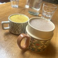 Highly recommend the golden milk (left) for a warming and tastefully spicy drink after your meal! Or a cacao drink if you want something similar to, but less sweet than a hot choc. at Mama  in Reykjavik