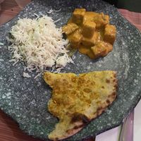 Vegan butter paneer (tofu) with rice and vegan garlic naan  at The Vegan Indian in Amsterdam