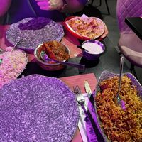 Vegan chicken biryani, vegan chicken tikka masala, rice, garlic naan, vegan raita  at The Vegan Indian in Amsterdam