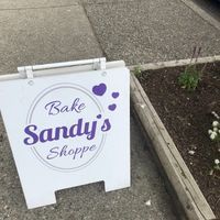 Sign on the sidewalk at Sandy's Bake Shoppe in Gibsons