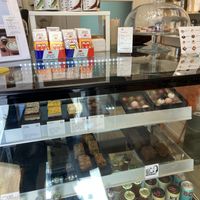 Some vegan options shown (bonbons, peanutbutter bar, brownie and Sue bites)  at The Chocolate Shop in The Hague