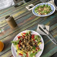 Salad with peas protein pieces and gnocchi with “meat"  at VeggieDick in Mikulov