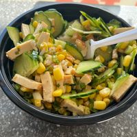 Sushi bowl with tofu, cucumbers, corn and original ginger dressing. at ALOH-O in Petaluma