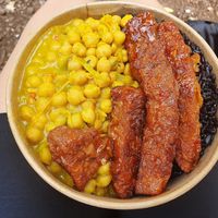 Chickpea curry with wheat meat and black rice. at Soul & Eden in West London