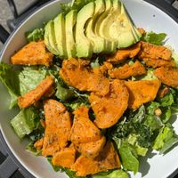 vegan ceasar salad with sweet potato and avocado  at Nirvana Tea House & Cafe in Millis