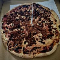 Friday evening pizza 🍕 😋 at Nirvana Tea House & Cafe in Millis