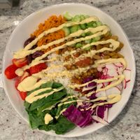 lentil love bowl with stewed lentils, fresh veggies and a coconut curry sauce at Nirvana Tea House & Cafe in Millis