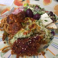 Quinoa gratin, spaghetti with soy meat, brocoli gratin, marinated tofu, raw veggies  at Vegetarian Center in Santa Cruz