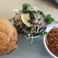 House burger with caesar salad at The Cider House in Vancouver