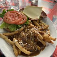 Vegan burger with upgraded side of poutine friess  at The Templeton in Vancouver