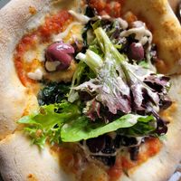 Vegan pizza with almond cheese at La Maria Bistro in Villa De Leyva