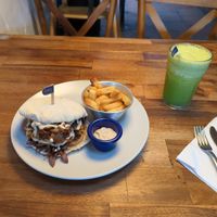 Vegan burger with fries and vegan dip + healthy green juice at La Maria Bistro in Villa De Leyva