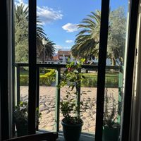 view out the window on the plaza at La Maria Bistro in Villa De Leyva