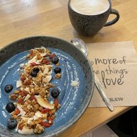 blue smoothie bowl & latte with almond milk at 42°Raw in Copenhagen