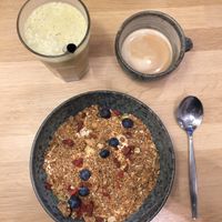 Granola, coffee and juice at 42°Raw in Copenhagen