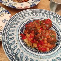 Albóndigas en salsa de pisto con patatas panadera  at La Odisea in Malaga