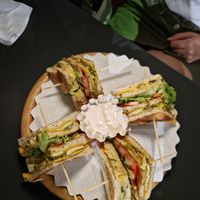 Club sandwich with hummus, vegetables, vegan cheese at Oasis Cafè in Treviso